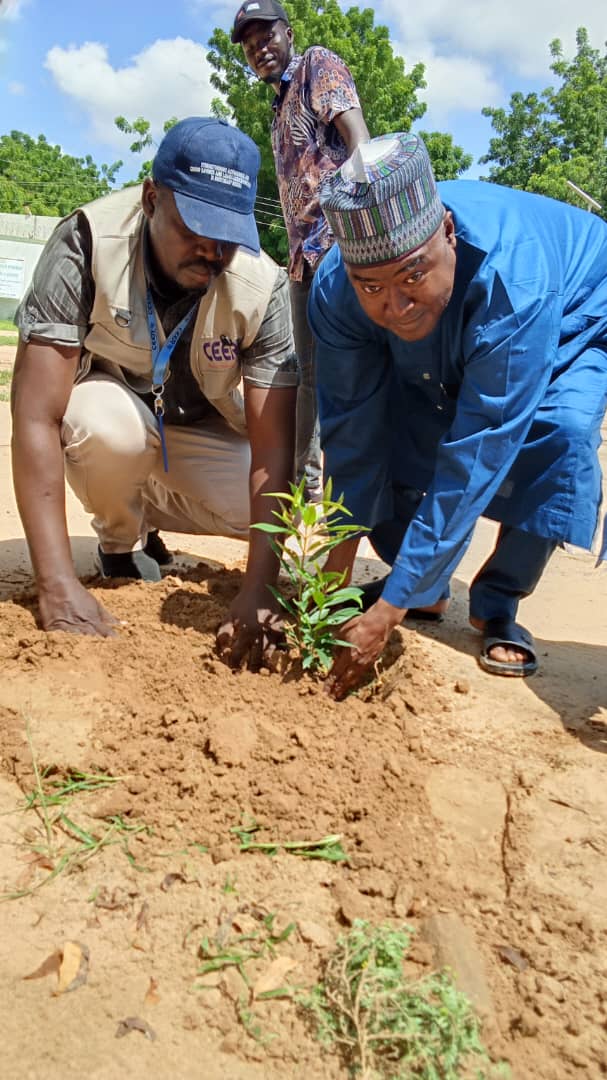 CEER and Federal Government College Maiduguri representatives planting a seedling