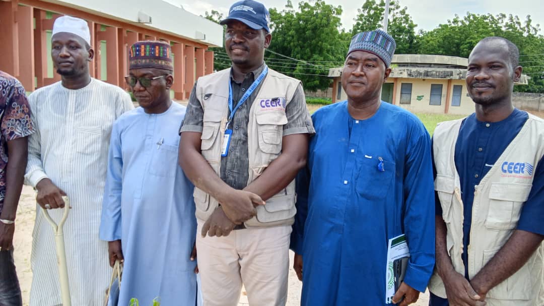 CEER staff with school management representatives